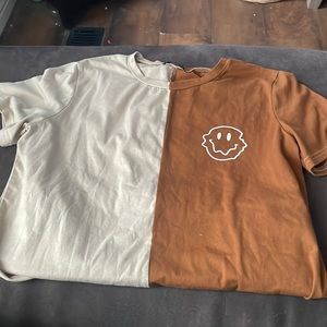 Half tan half brown with smily face on the brown side